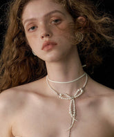 Collar con colgante doble de borla y cadena de lazo de perla de aleación blanca de moda